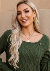 Woman wearing Anya green sweater with a beige background