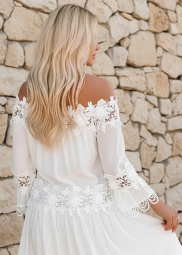 Woman wearing Diaz white off shoulder mini dress