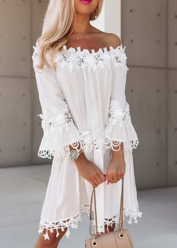 Woman wearing Diaz white off shoulder mini dress