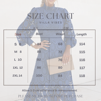 A size chart graphic for Villa Vibes clothing, showing a woman wearing a blue Lace Jasmine dress in the background and a size table listing bust, waist, and length measurements from S to 2XL.