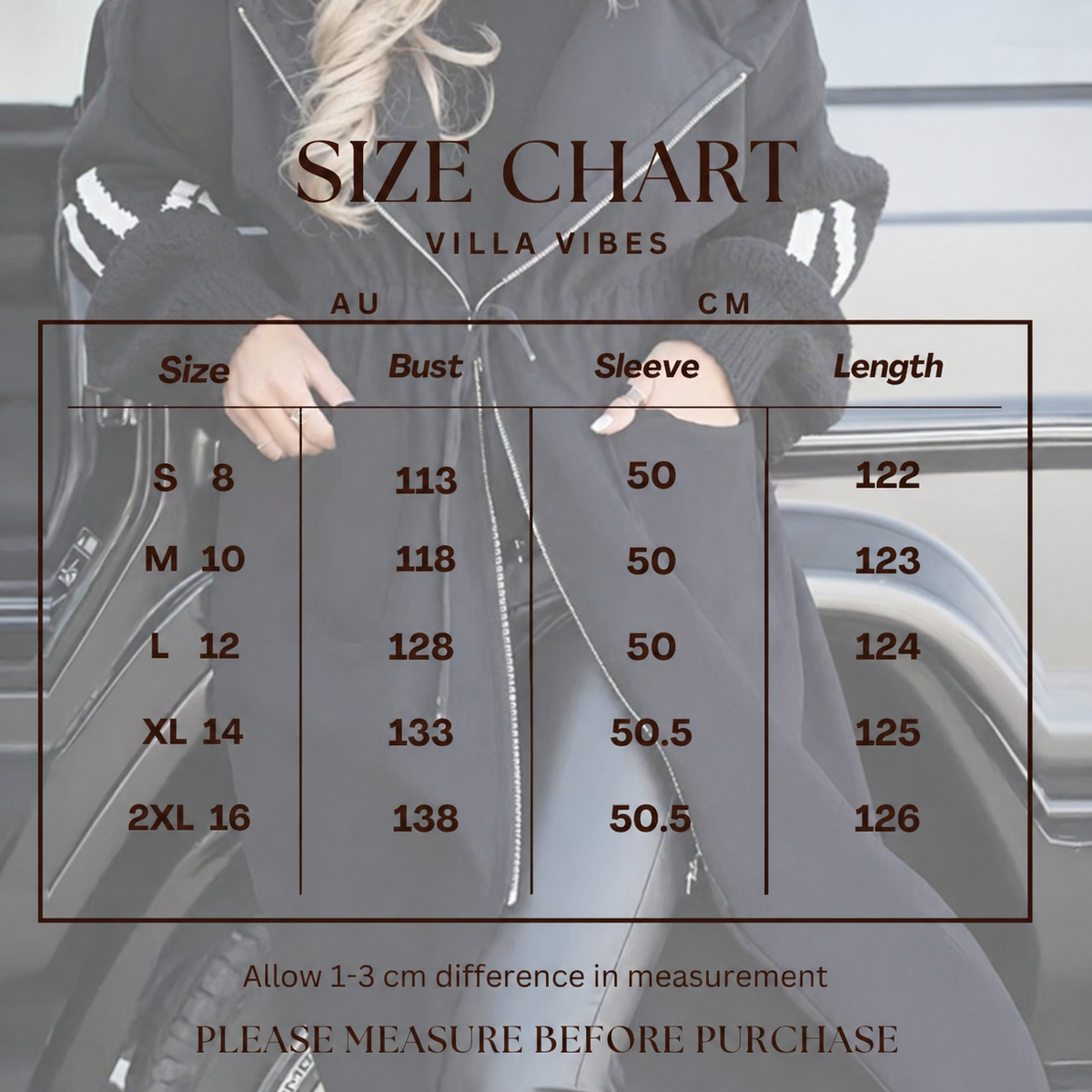 Size chart for clothing with measurements in AU and CM, overlaid on a blurred background of a person wearing a black Kelly Coat