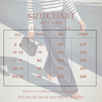 McKenzie High-Rise Wide Leg Jeans.