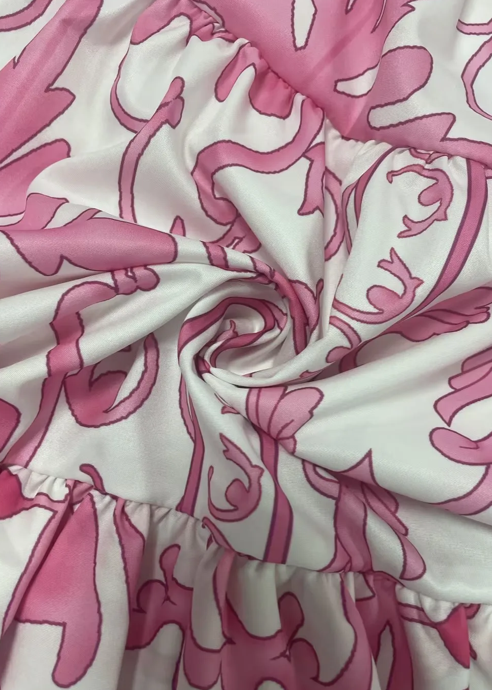 Close-up of Meania pink and white patterned fabric