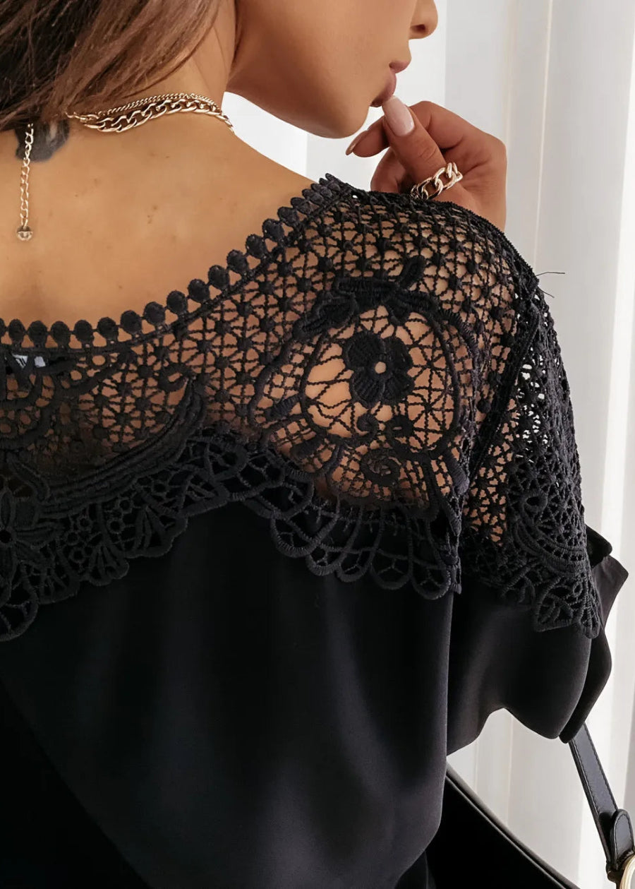 St Barts Black Lace Top worn by a person, with a focus on the intricate detailing.