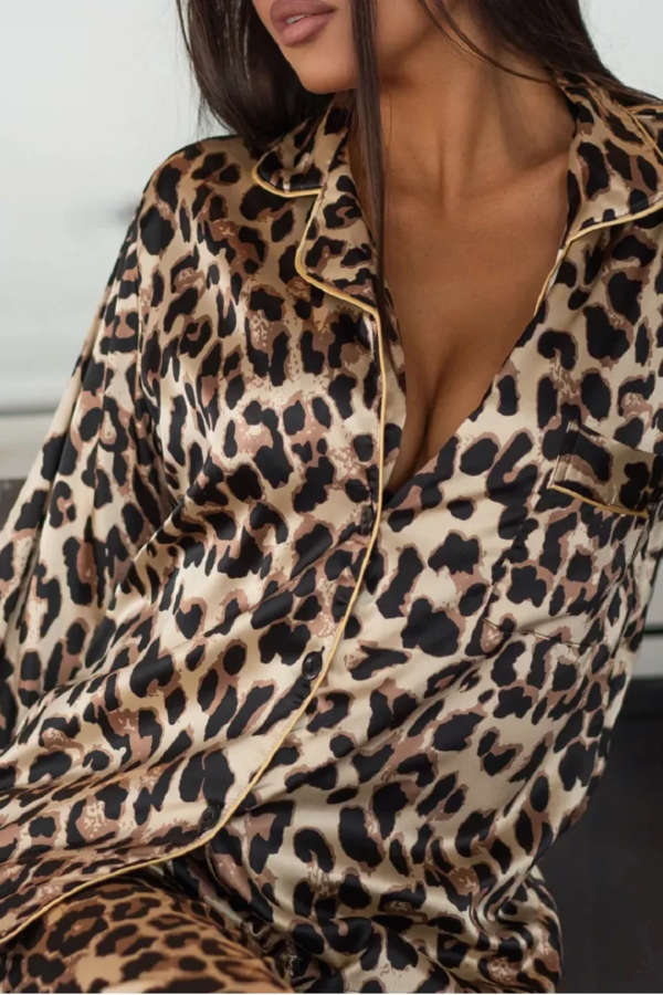 Villa Vibes Midnight Leopard print satin robe worn by a person