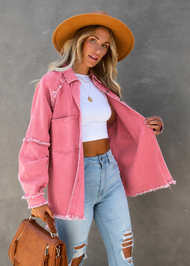 Model wearing an open Villa VIbes Brydie Pink Shirt wearing hat and carrying brown bag.