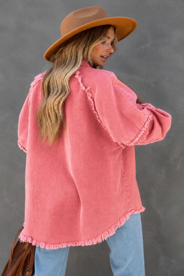 Back view of Model wearing Villa VIbes Brydie Pink Shirt wearing hat and carrying brown bag.