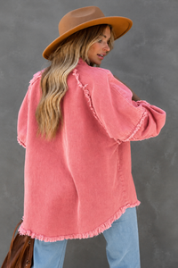 Back view of Model wearing Villa VIbes Brydie Pink Shirt wearing hat and carrying brown bag.
