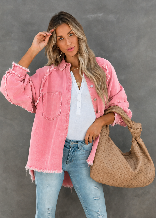 Model wearing Villa VIbes Brydie Pink Shirt carrying large brown bag.