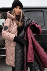 Woman holding three Villa Vibes Cameron quilted coats in front of a car
