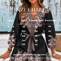 Villa Vibes Cassandra Size chart for a black dress with floral patterns on a wooden background