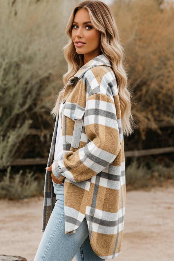 Woman wearing a Villa Vibes Cassidy plaid coat outdoors with a natural background