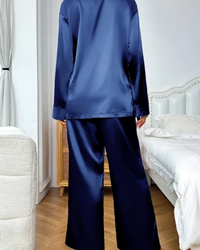 Villa Vibes Cloud_Nine_Navy_Silky_2pc_PJ_Set view from behind of model