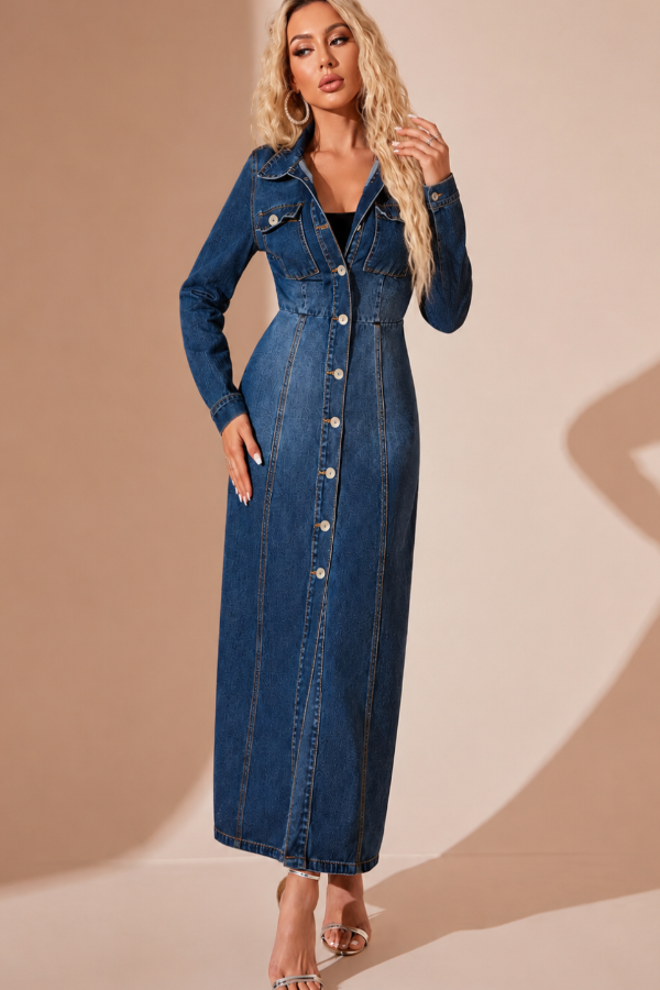 Woman wearing a Villa Vibes Jordie long denim dress against a beige background