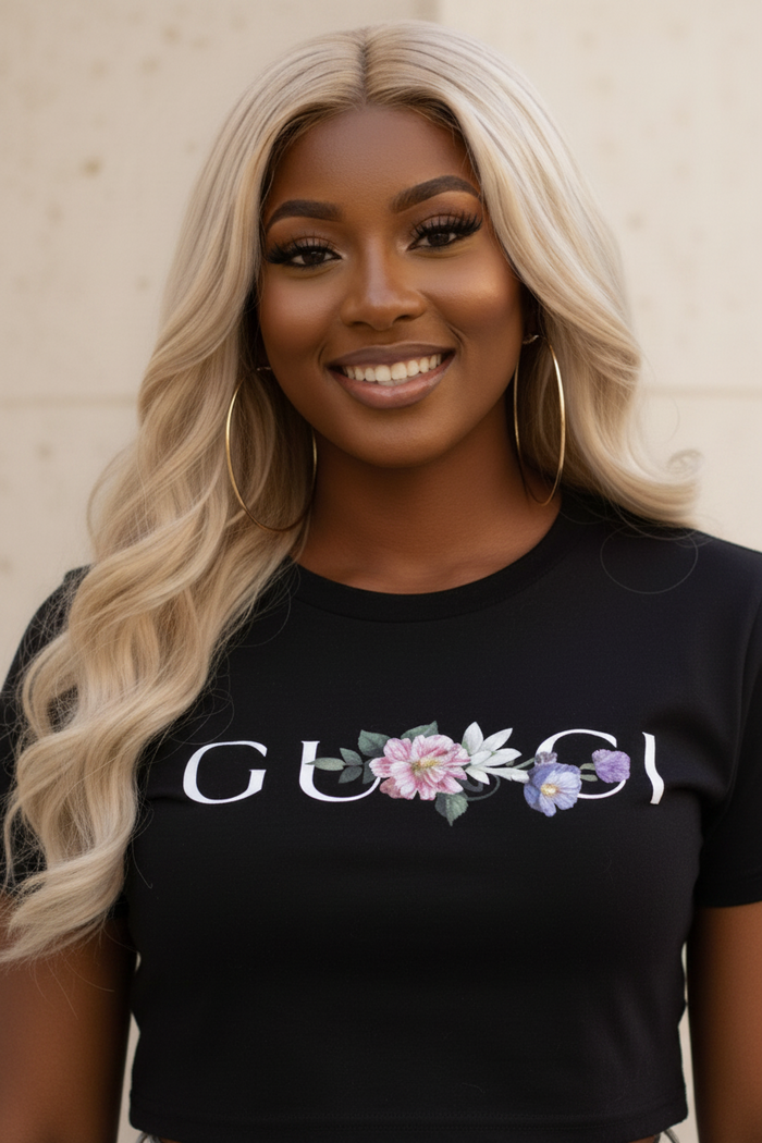 WOman wearing a Villa Vibes black luxury brand t shirt