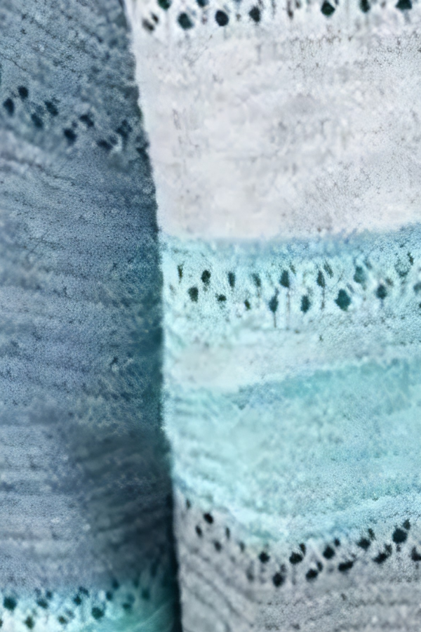 Close-up of Villa VIbes Pippa knitted fabric with blue and gray pattern